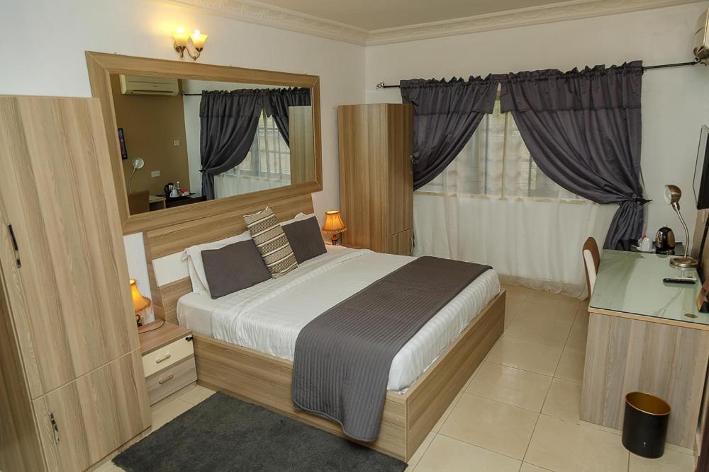 Apartment Royale Hotel & Suite Лагос Экстерьер фото